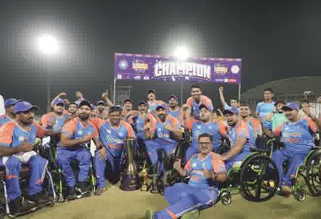 Indian wheelchair cricket team celebrating as champions